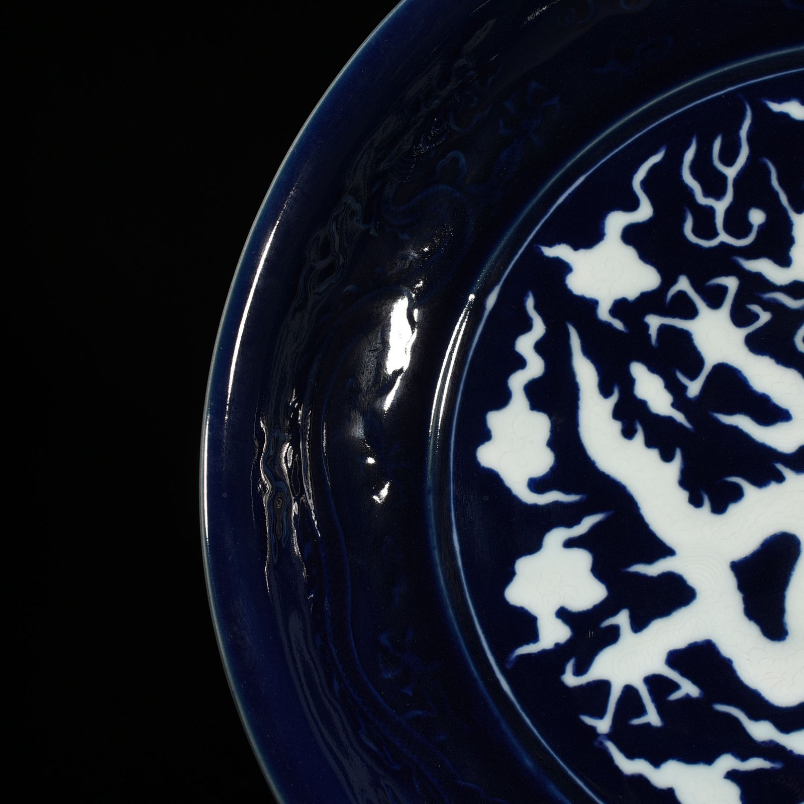 Yuan Dynasty blue glaze carved dragon plate