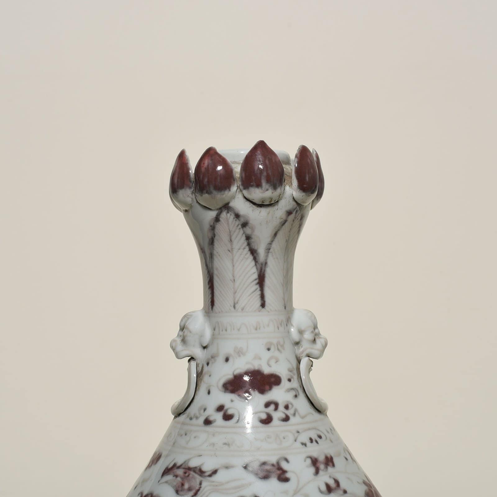 Yuan Dynasty glazed red garlic vase with branches and phoenix pattern