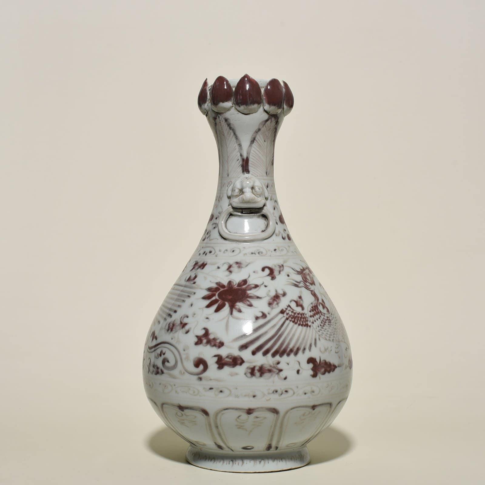 Yuan Dynasty glazed red garlic vase with branches and phoenix pattern