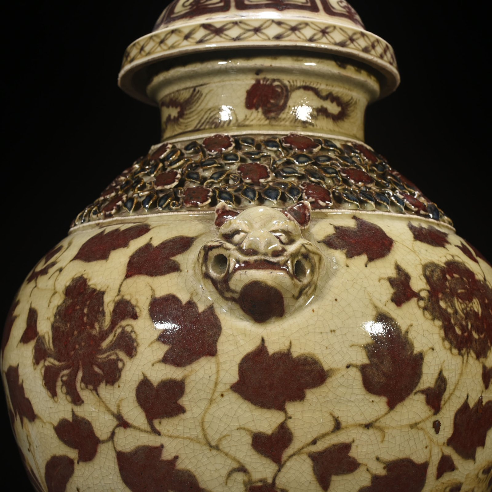 Yuan Dynasty glazed red plastic flower peacock peony pattern animal ear lid jar