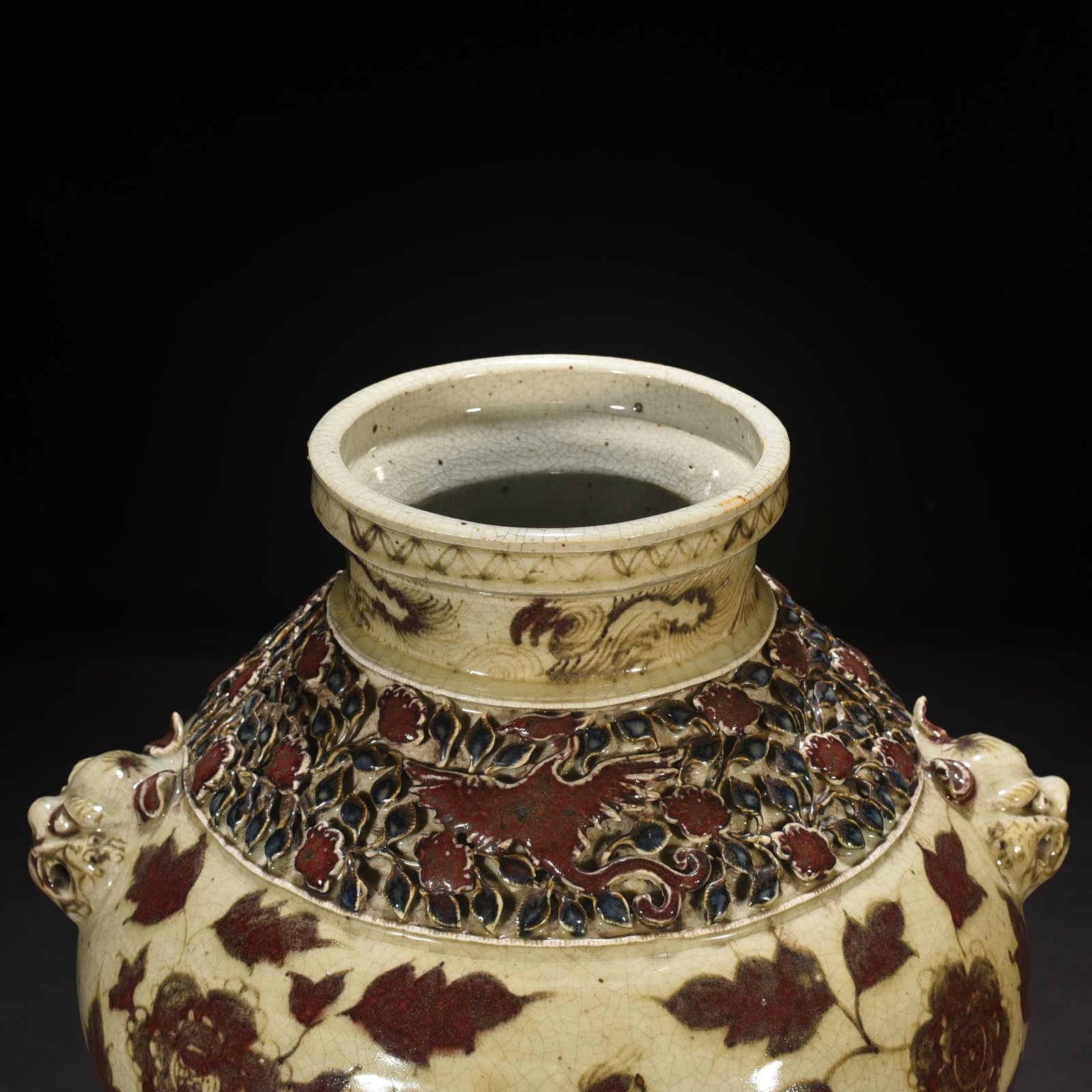 Yuan Dynasty glazed red plastic flower peacock peony pattern animal ear lid jar