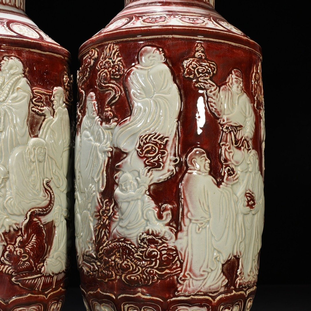 Yuan Dynasty underglaze red carved mallet vase with eighteen arhat figures