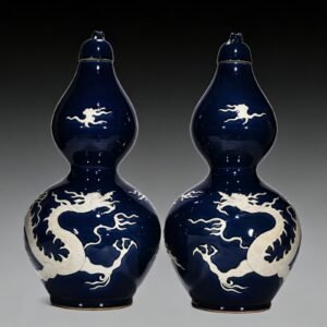 Yuan Dynasty blue gourd bottle with white engraved cloud and dragon pattern