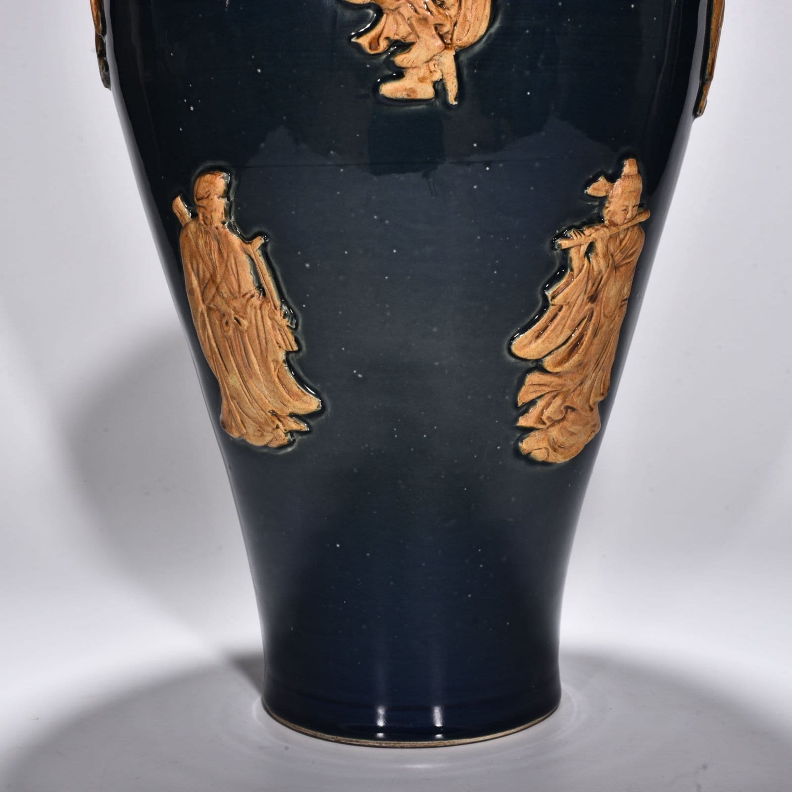 Yuan Dynasty blue glaze embossed plum vase with figures of the Eight Immortals