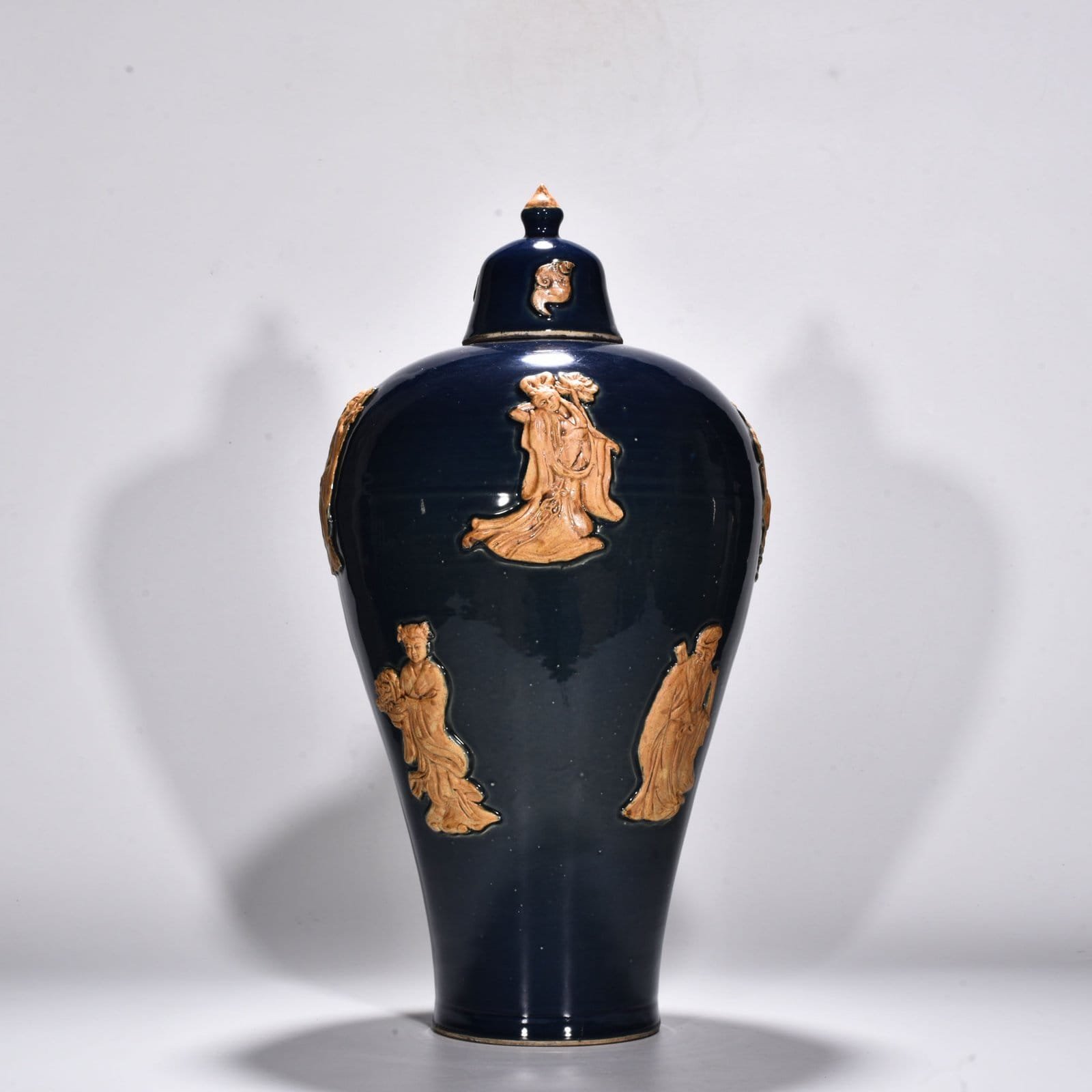 Yuan Dynasty blue glaze embossed plum vase with figures of the Eight Immortals