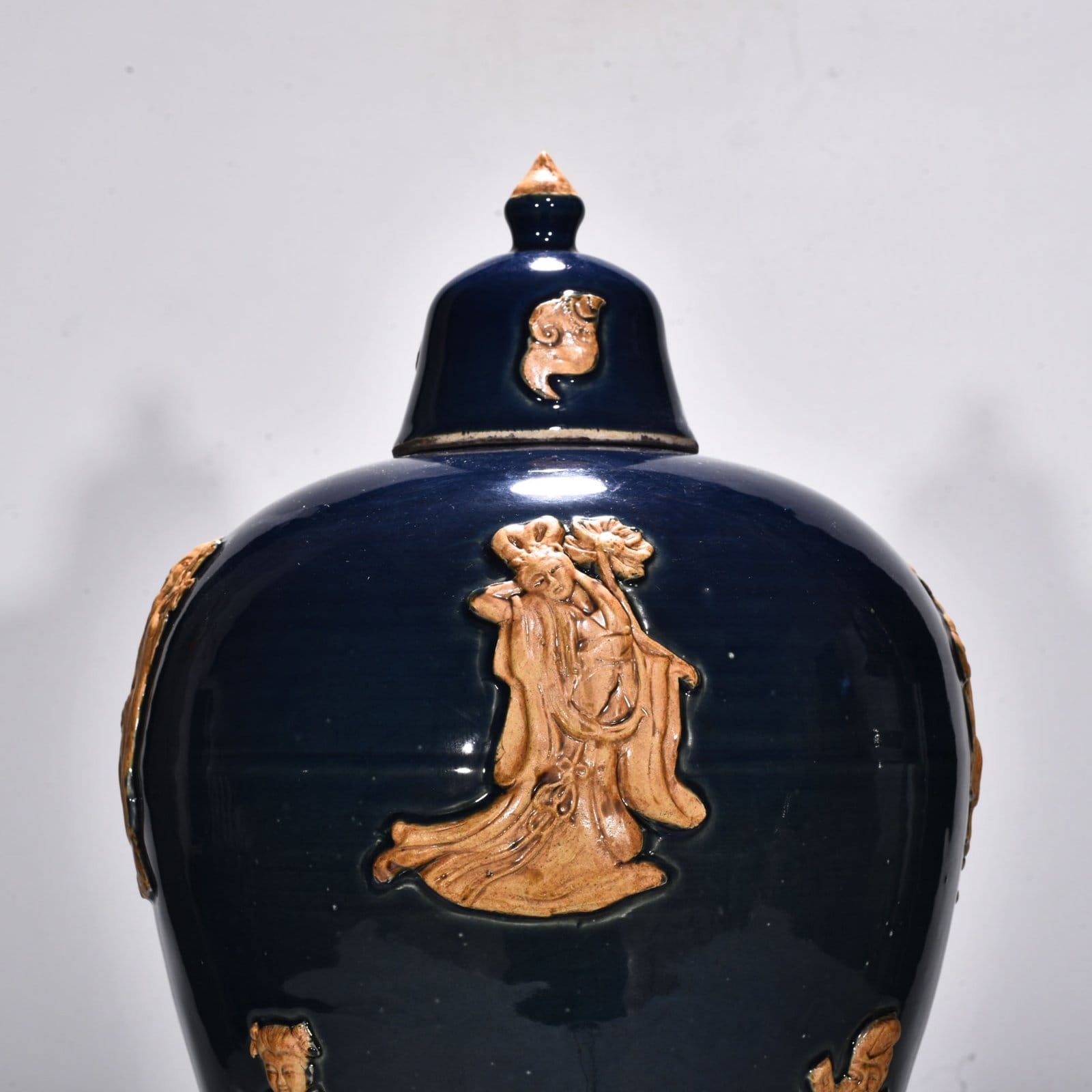 Yuan Dynasty blue glaze embossed plum vase with figures of the Eight Immortals
