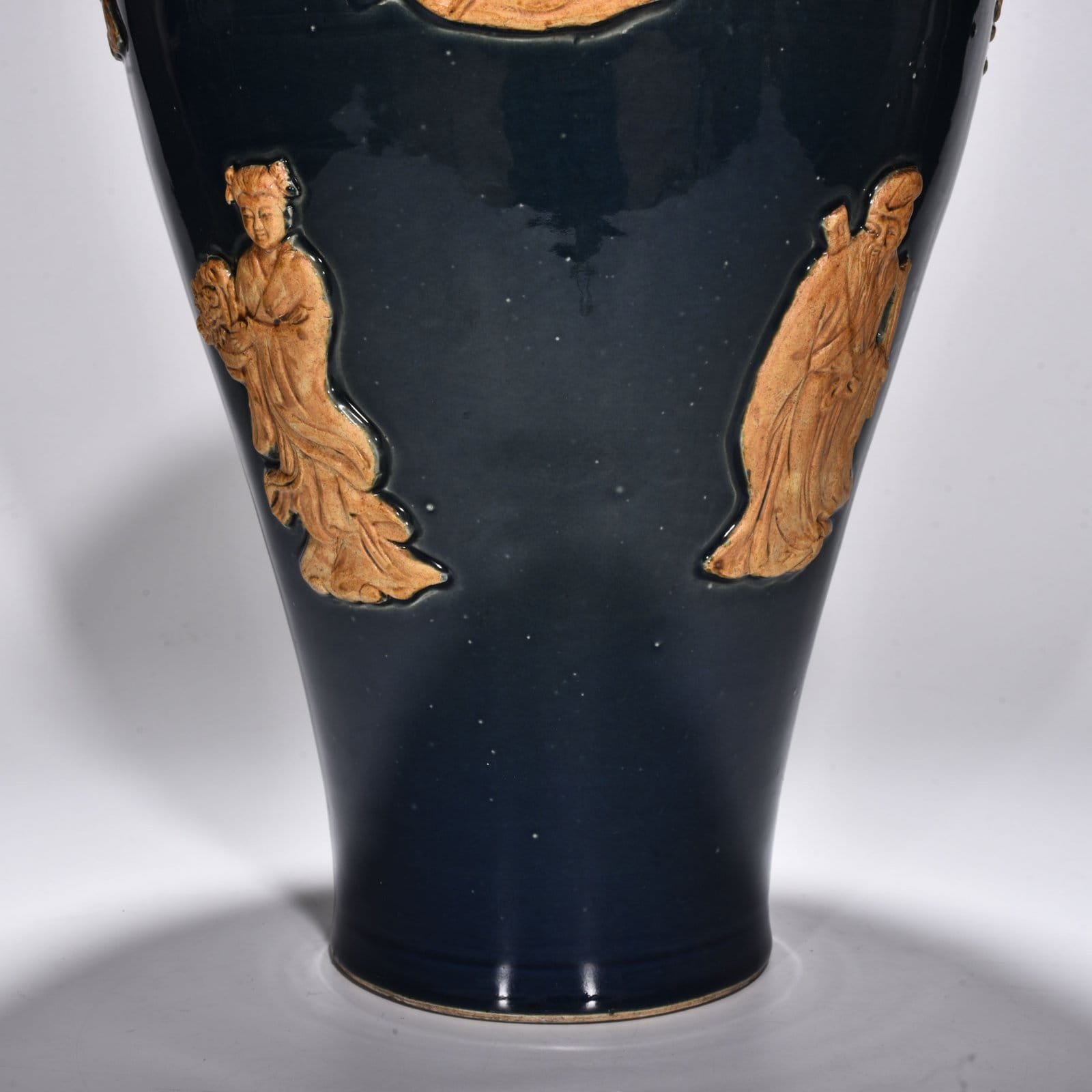 Yuan Dynasty blue glaze embossed plum vase with figures of the Eight Immortals