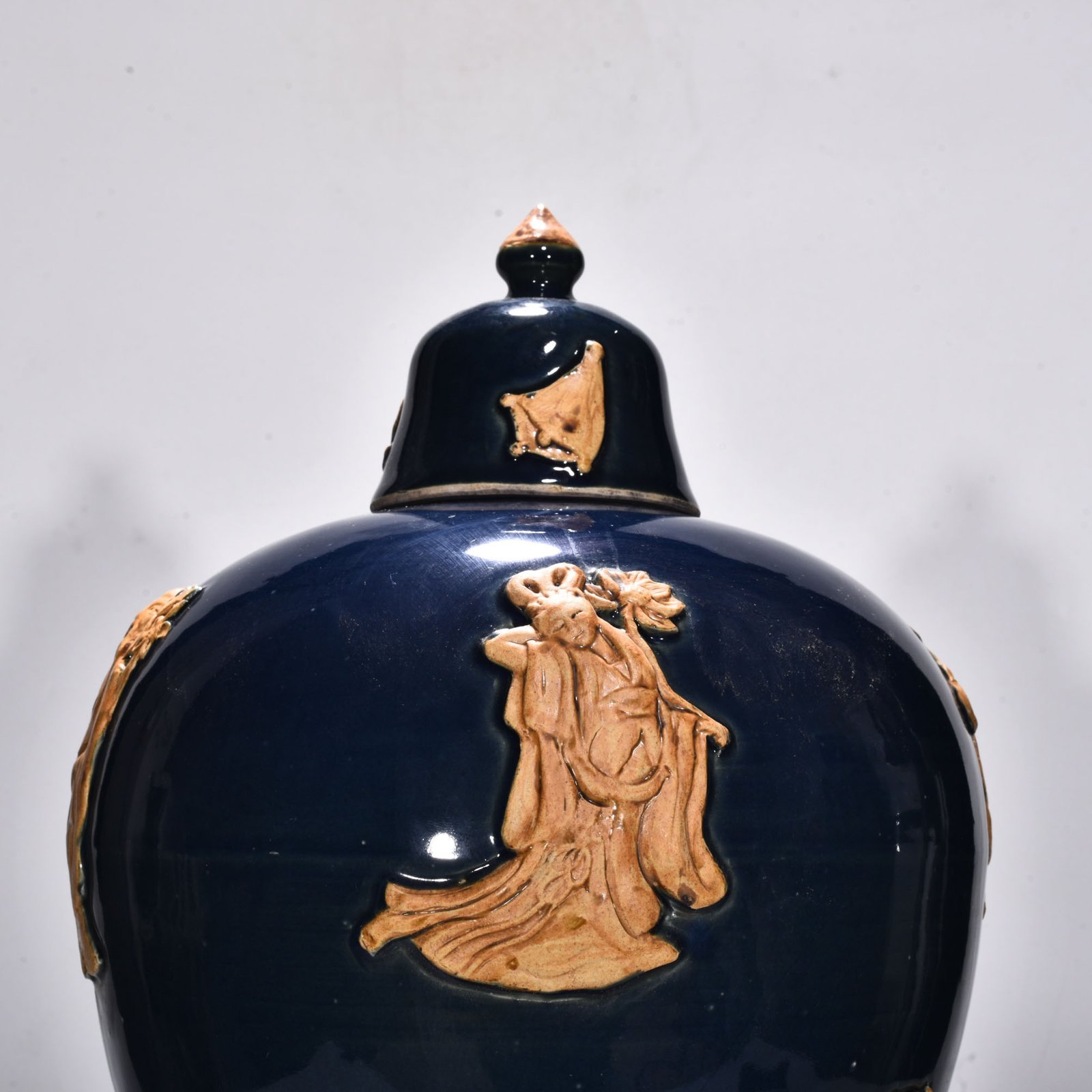 Yuan Dynasty blue glaze relief plum vase with figures of the Eight Immortals