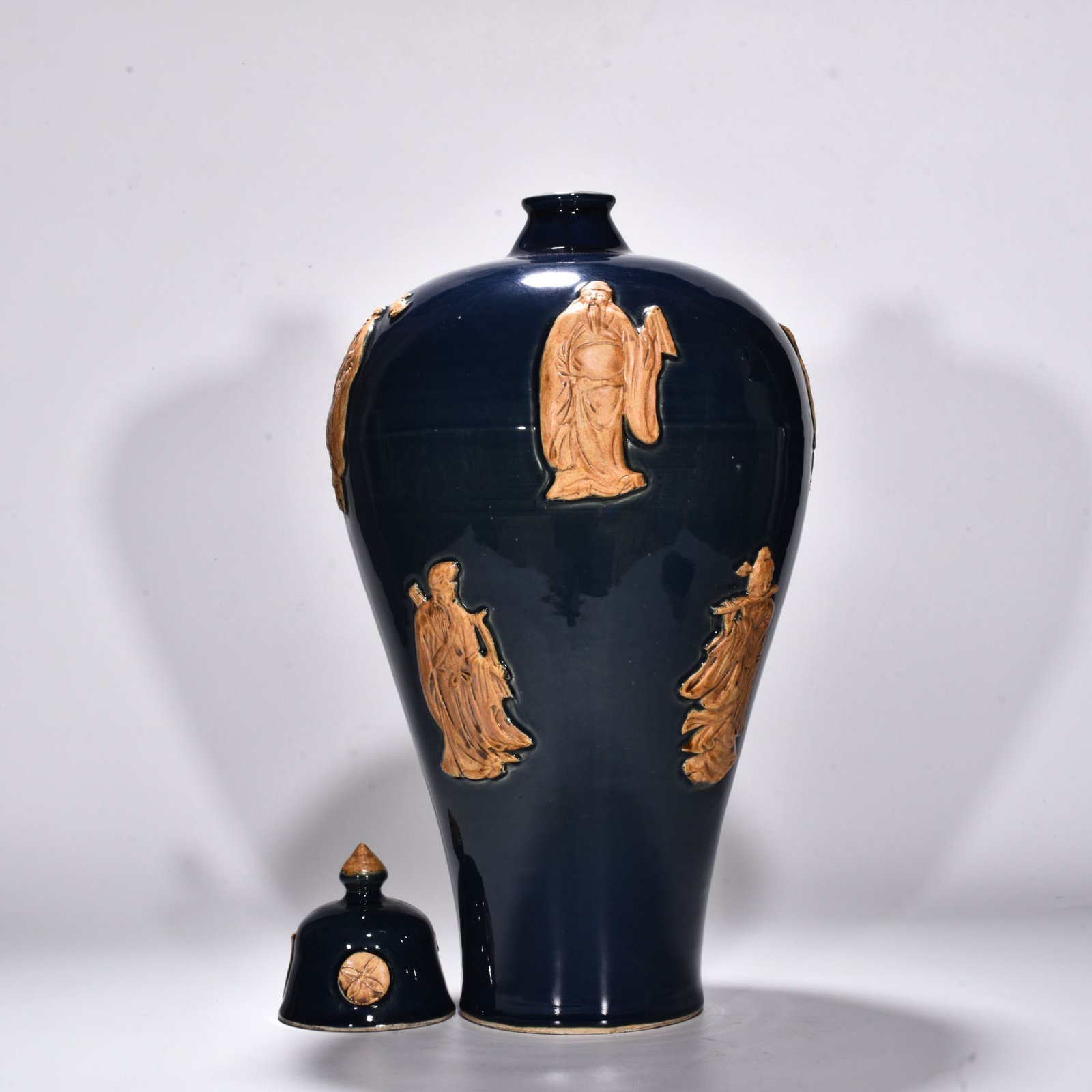 Yuan Dynasty blue glaze relief plum vase with figures of the Eight Immortals