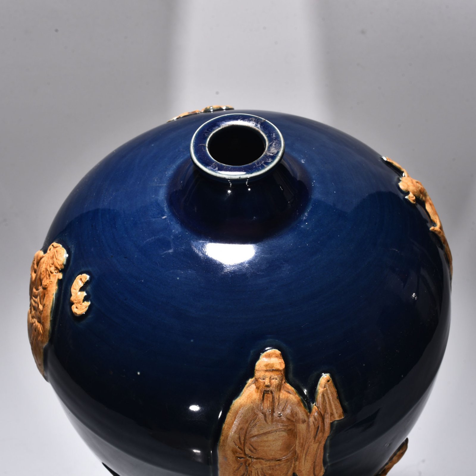 Yuan Dynasty blue glaze relief plum vase with figures of the Eight Immortals