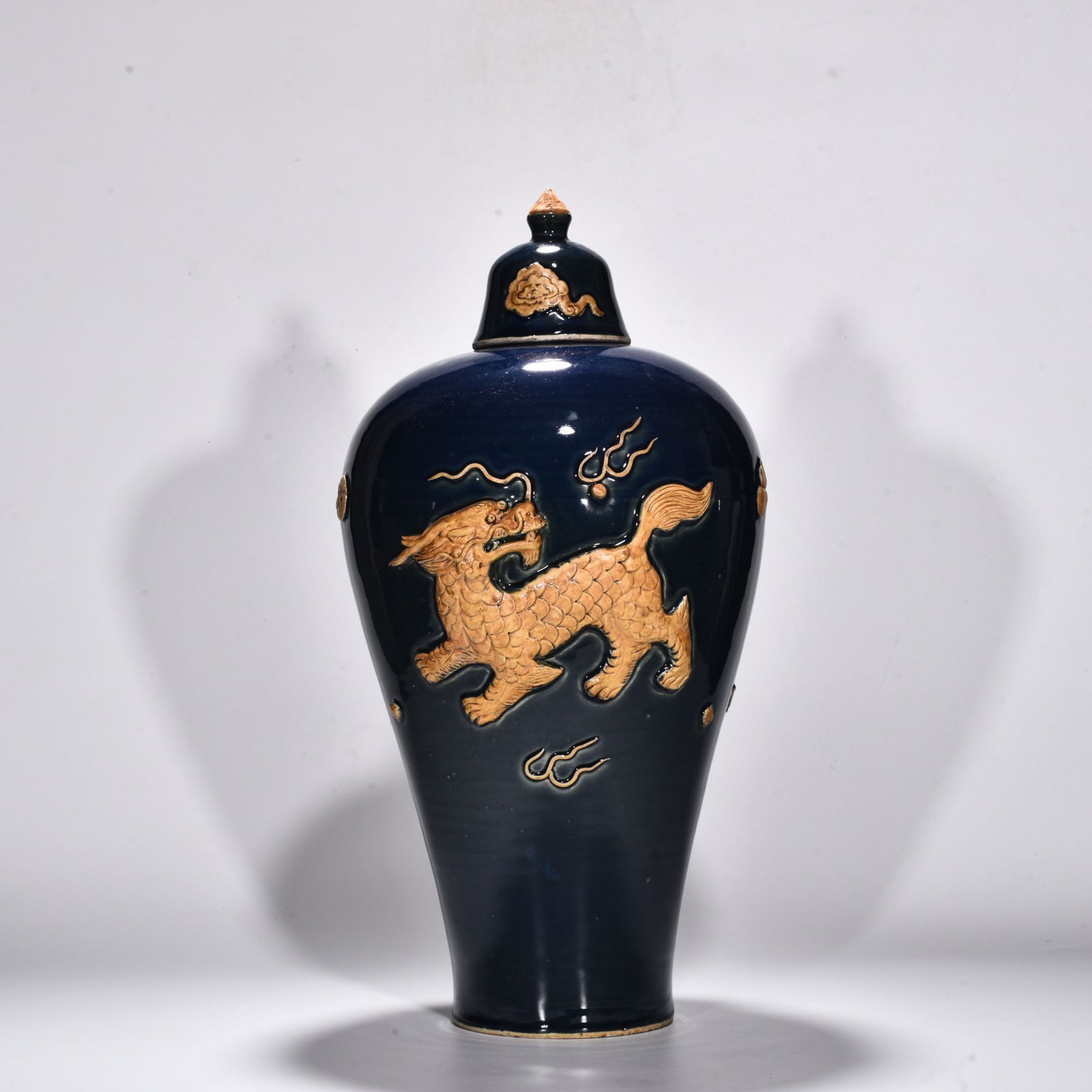 Yuan Dynasty blue glaze relief unicorn pattern plum vase