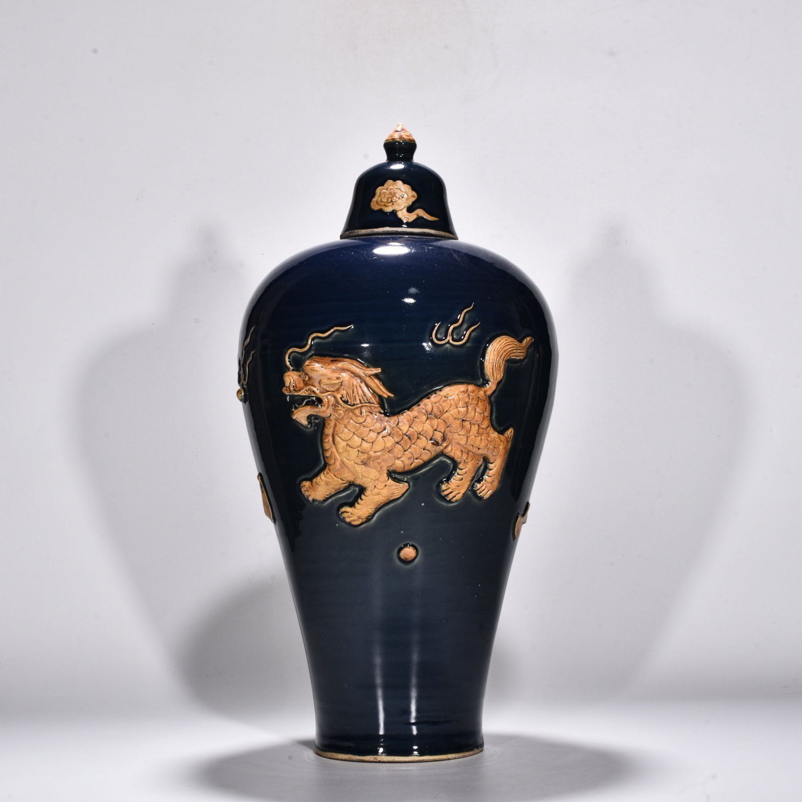 Yuan Dynasty blue glaze relief unicorn pattern plum vase
