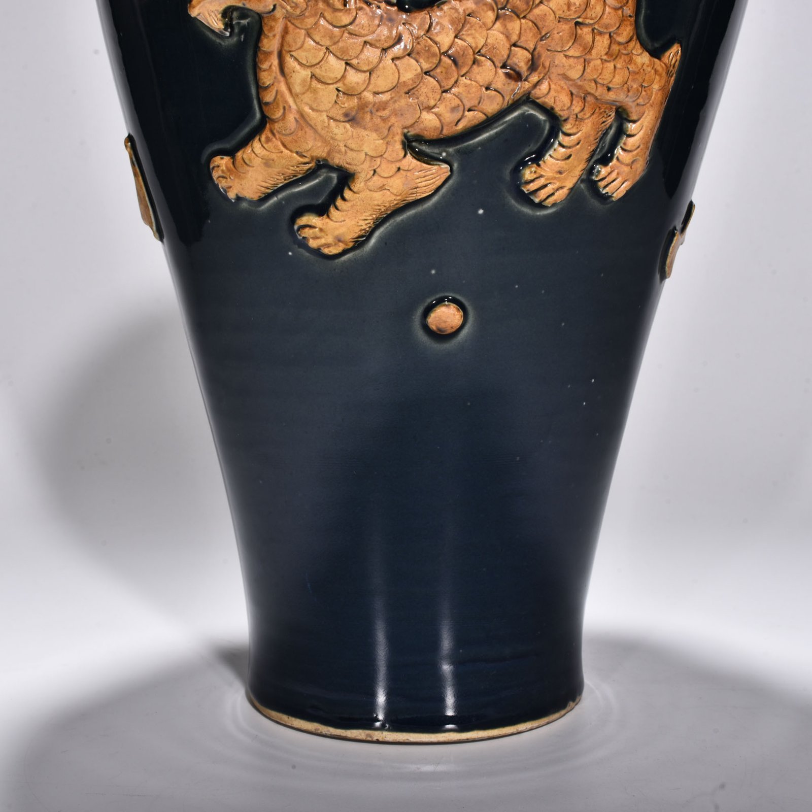 Yuan Dynasty blue glaze relief unicorn pattern plum vase