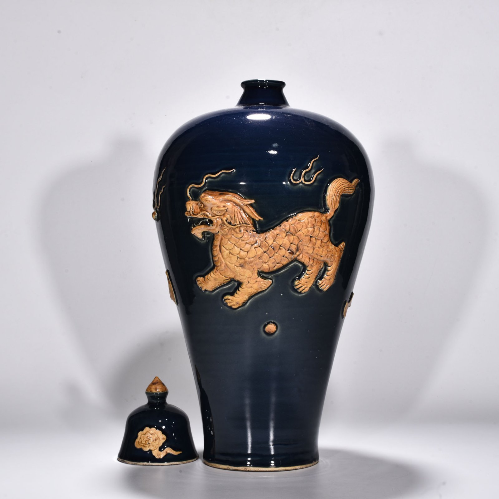 Yuan Dynasty blue glaze relief unicorn pattern plum vase
