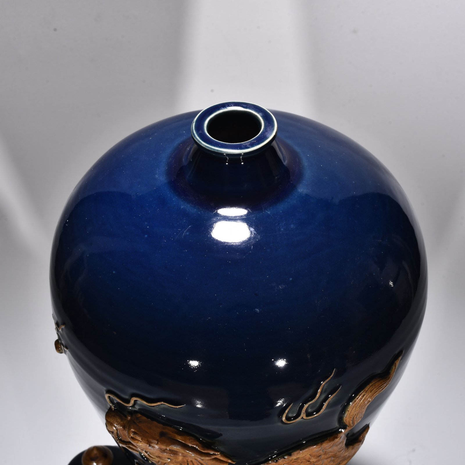 Yuan Dynasty blue glaze relief unicorn pattern plum vase