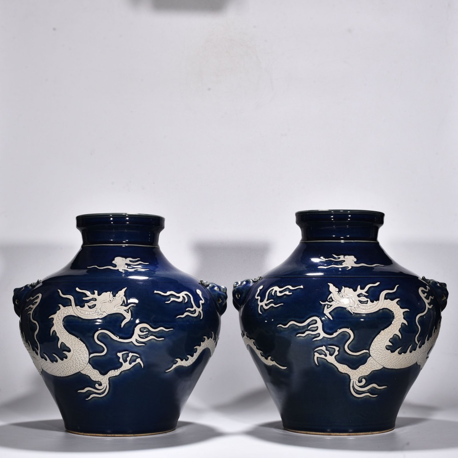 Yuan Dynasty blue glaze blank animal ear jar engraved with clouds and dragons