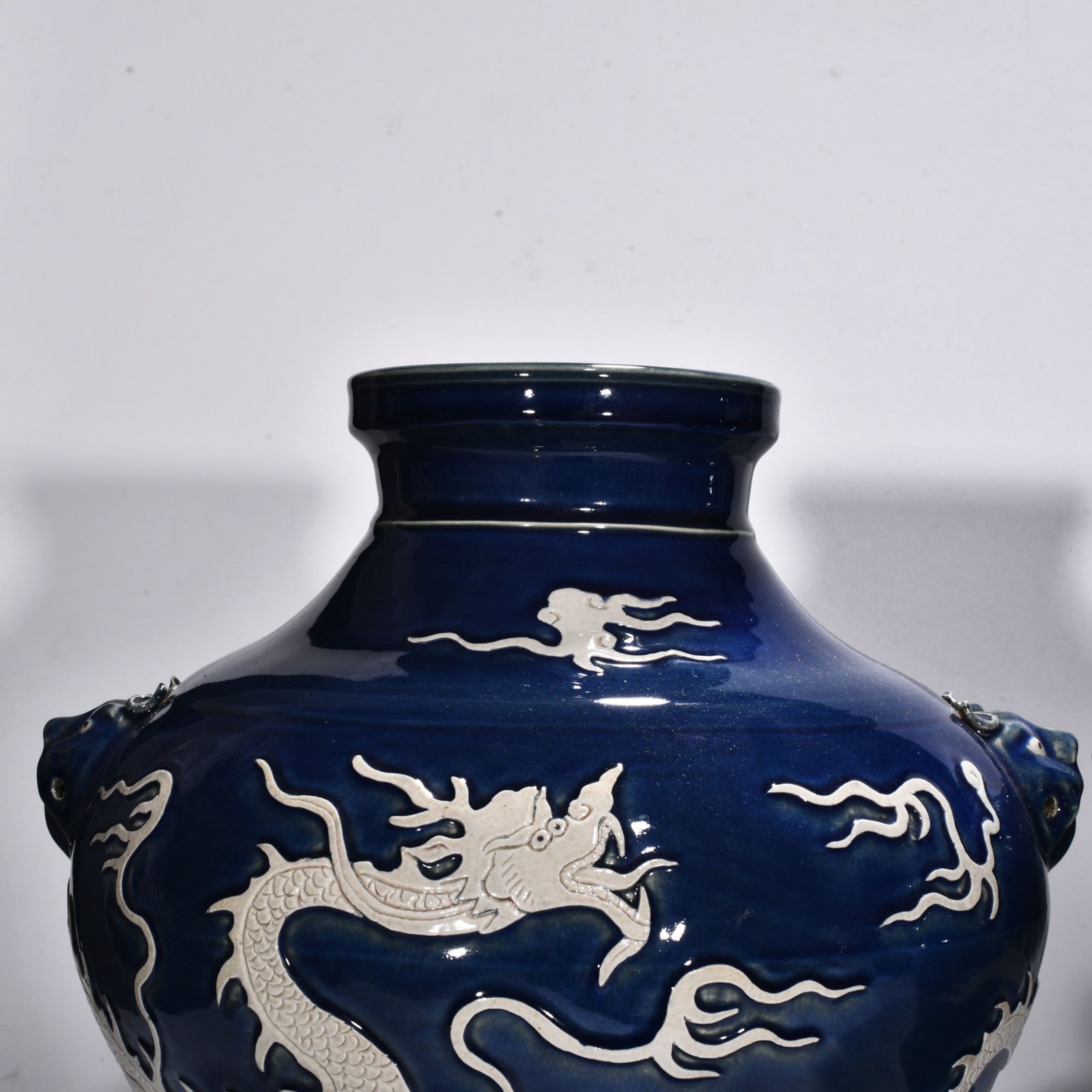 Yuan Dynasty blue glaze blank animal ear jar engraved with clouds and dragons