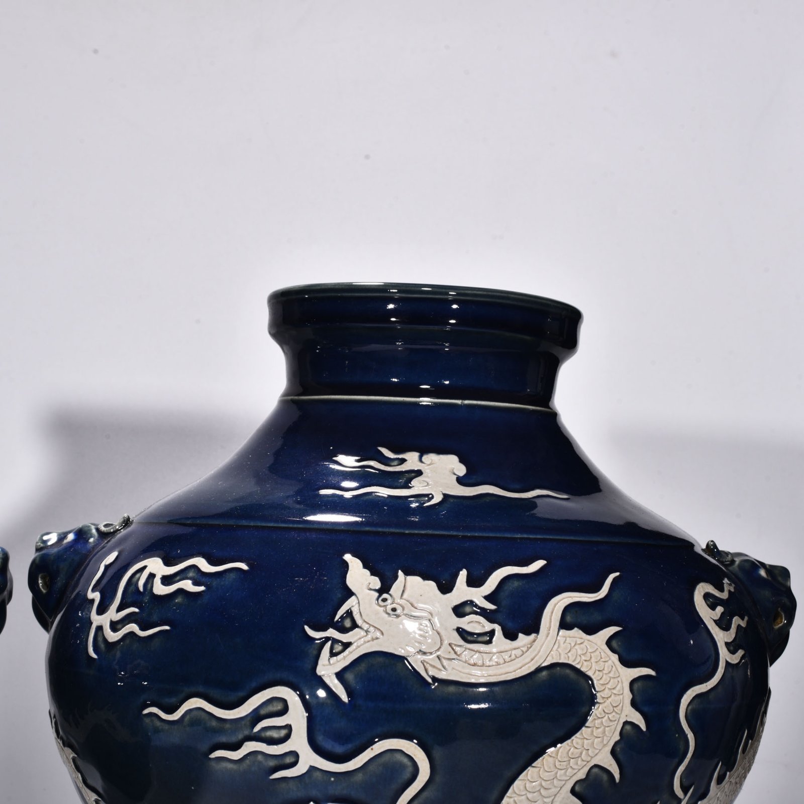 Yuan Dynasty blue glaze blank animal ear jar engraved with clouds and dragons