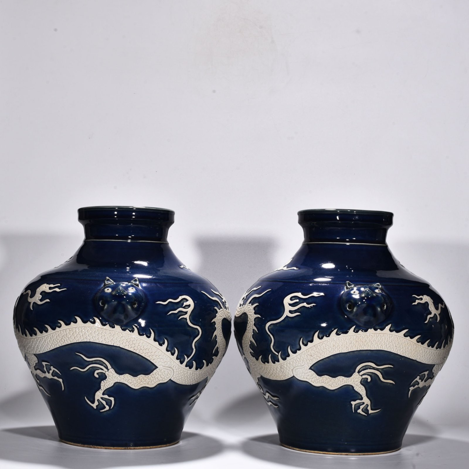 Yuan Dynasty blue glaze blank animal ear jar engraved with clouds and dragons