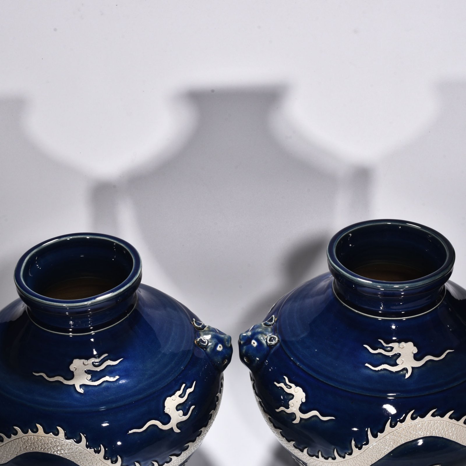 Yuan Dynasty blue glaze blank animal ear jar engraved with clouds and dragons