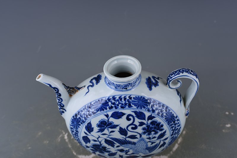 Yuan Dynasty blue and white phoenix peony pattern flat pot