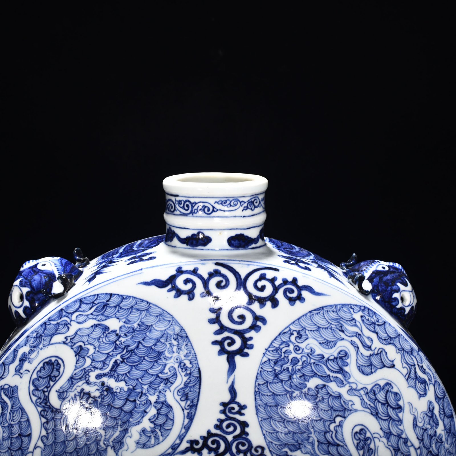 Yuan Dynasty blue and white sea water dragon pattern flat pot