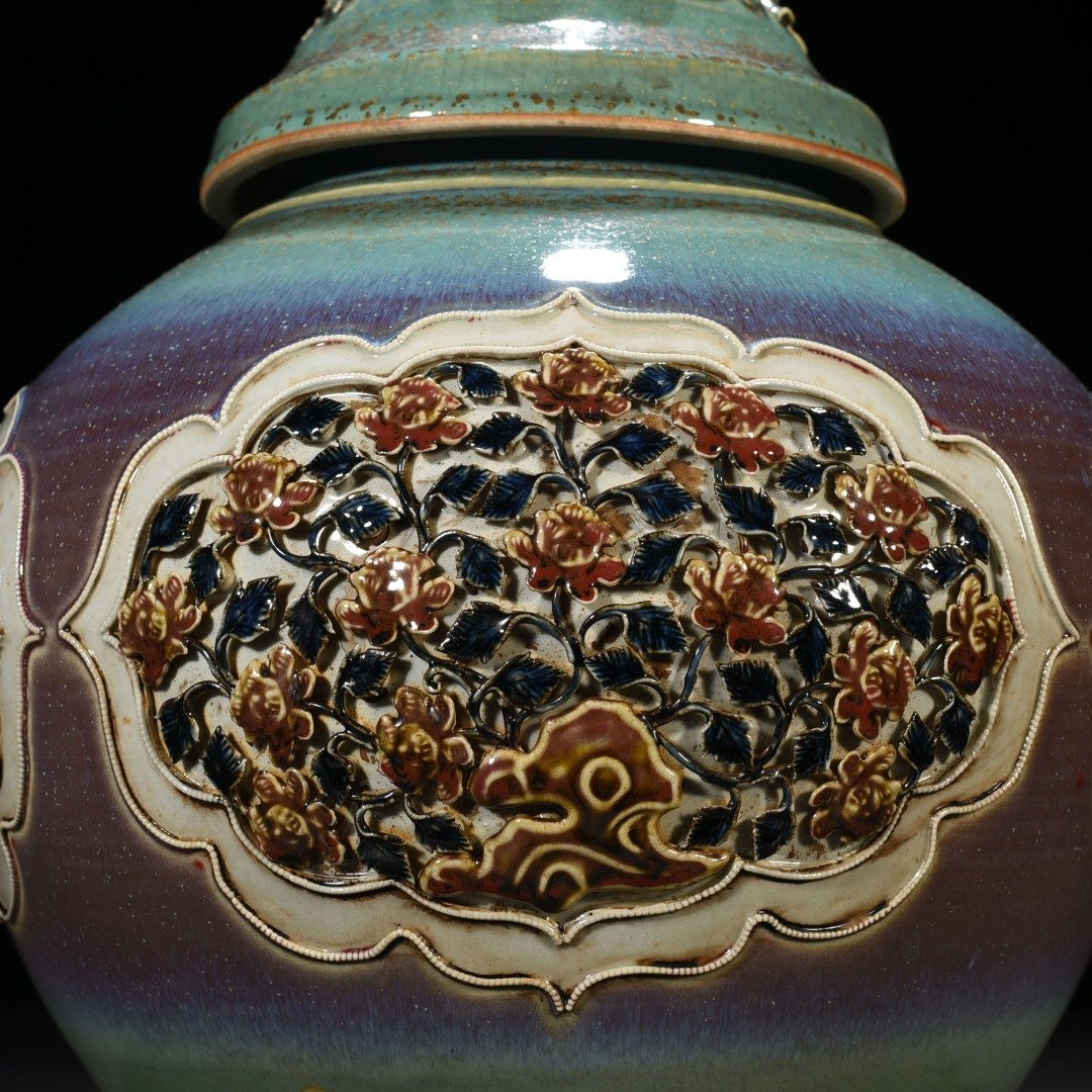 Yuan Dynasty blue and white underglaze red dazzling glaze laminated four seasons flower lid jar