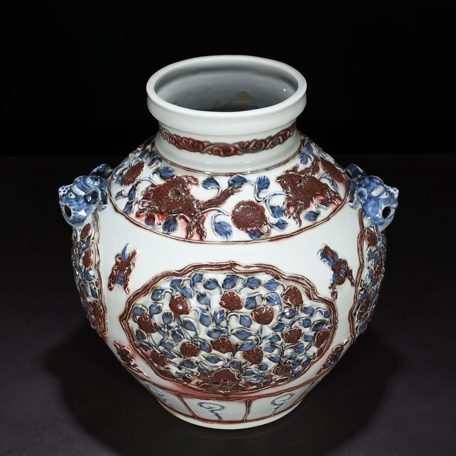 Yuan Dynasty blue and white underglaze red plastic animal ear jar
