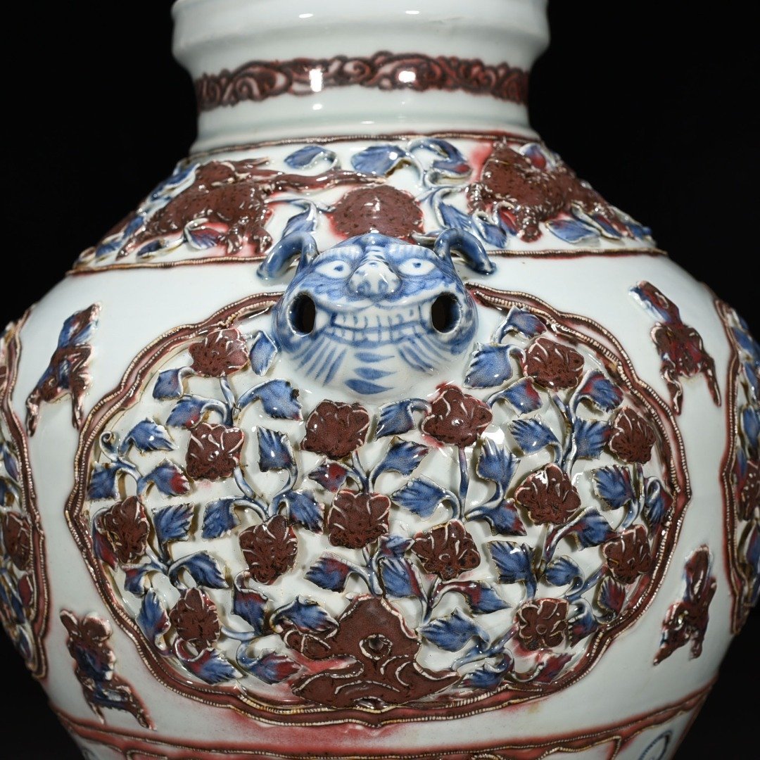 Yuan Dynasty blue and white underglaze red plastic animal ear jar