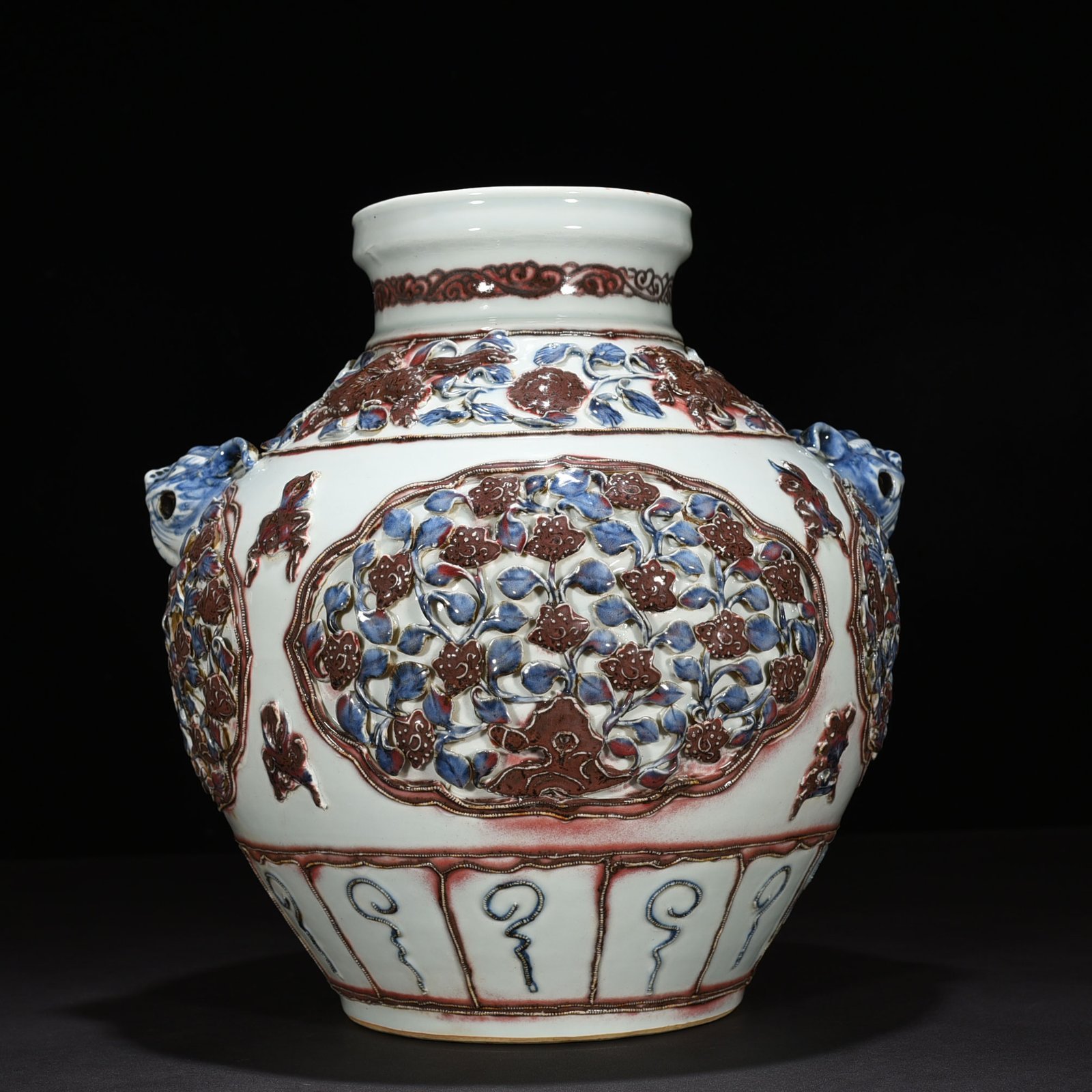 Yuan Dynasty blue and white underglaze red plastic animal ear jar