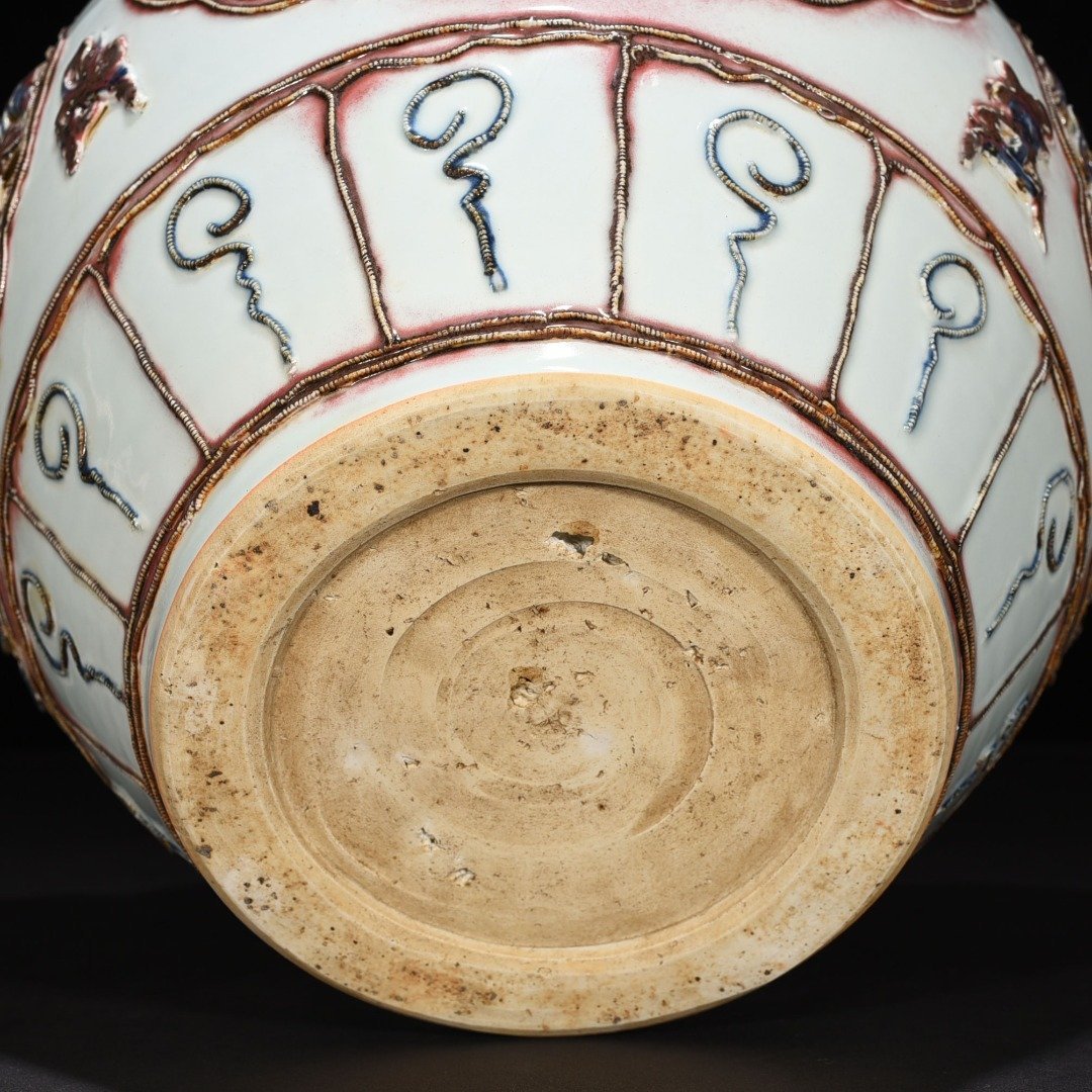 Yuan Dynasty blue and white underglaze red plastic animal ear jar