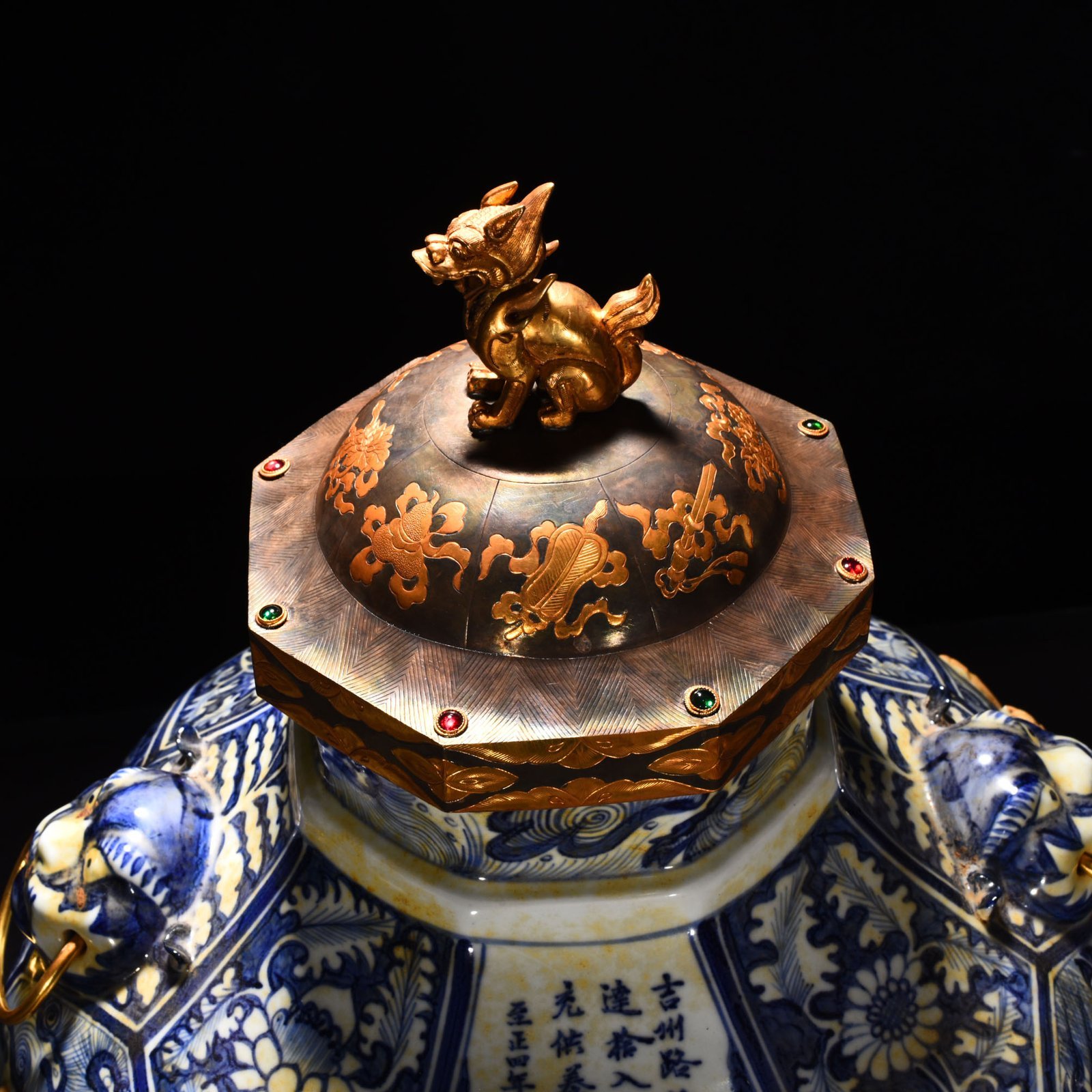 Yuan Dynasty blue and white carved four beast head cover jar