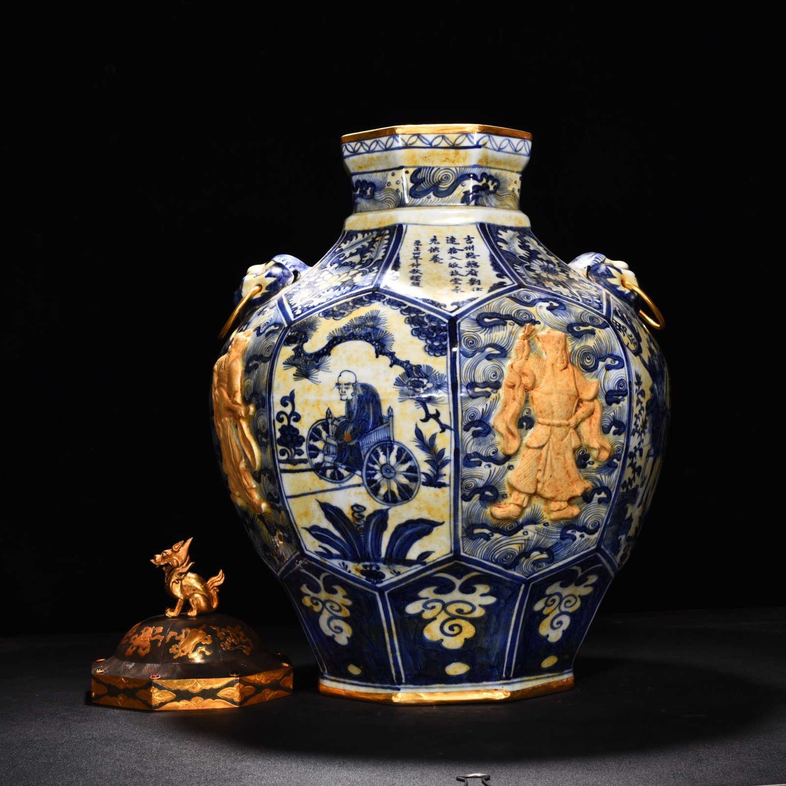 Yuan Dynasty blue and white carved four beast head cover jar