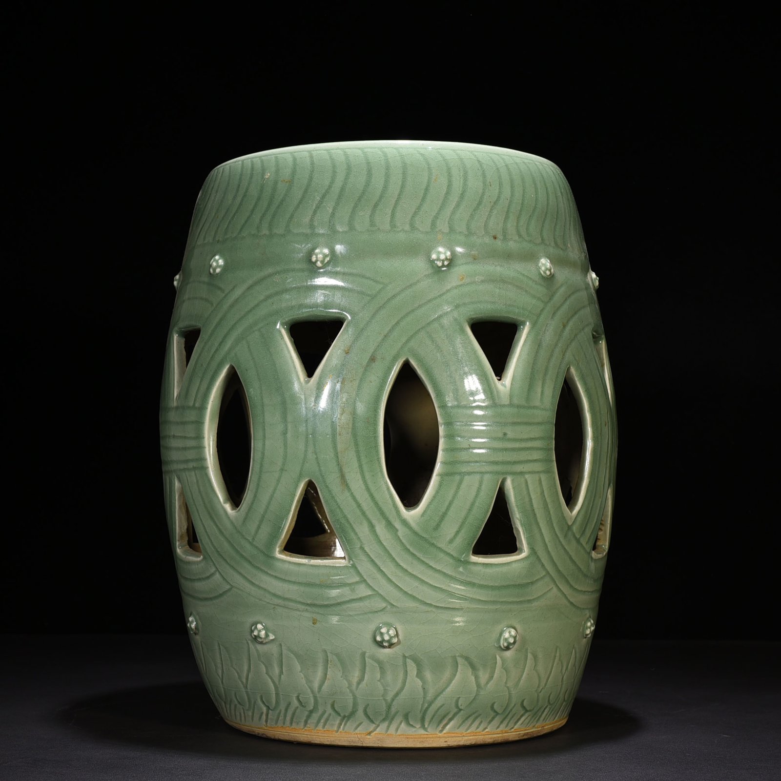 Yuan Dynasty plum celadon hollow drum stool