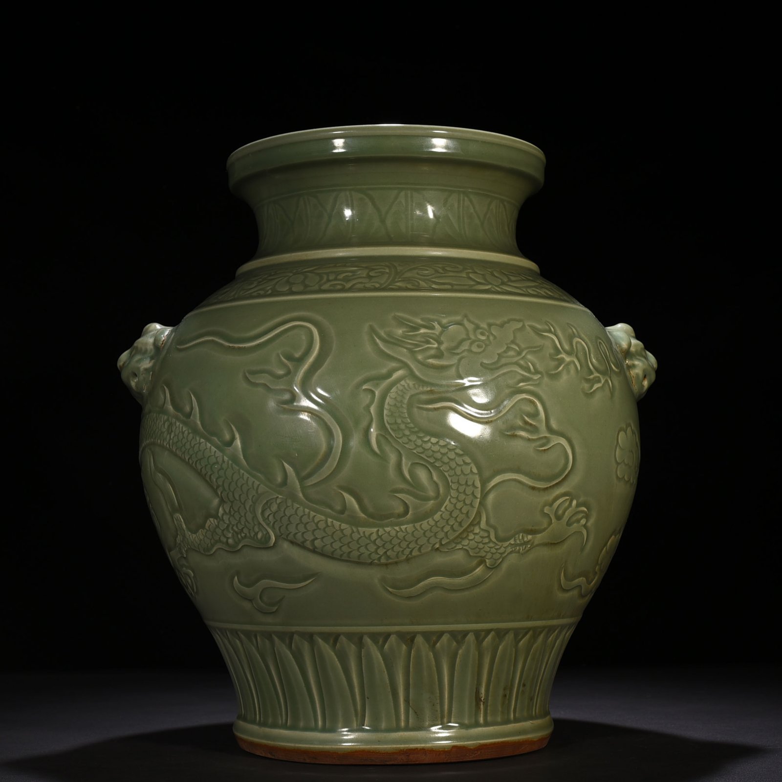 Yuan Dynasty large jar with carved dragon and animal ears