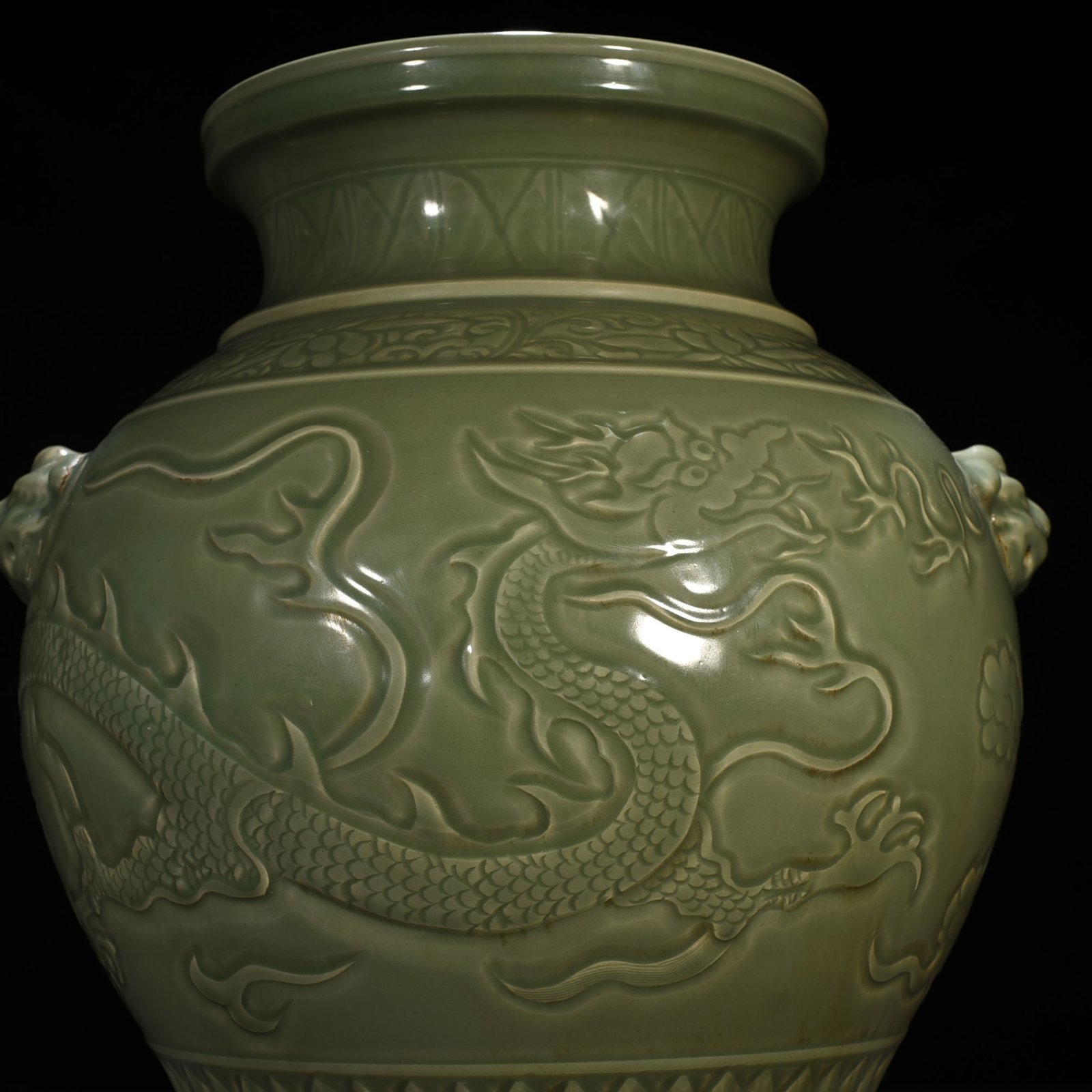 Yuan Dynasty large jar with carved dragon and animal ears