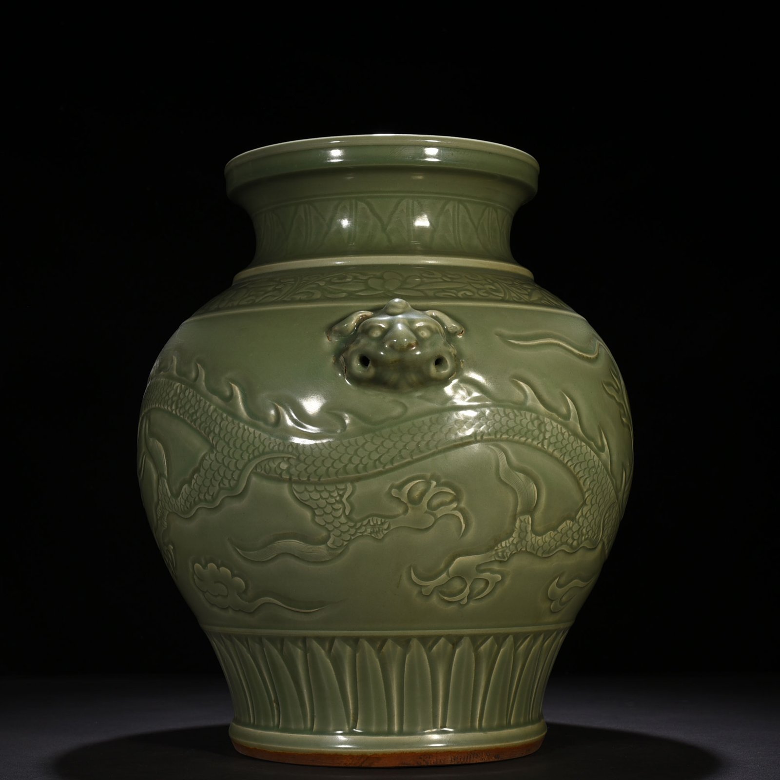 Yuan Dynasty large jar with carved dragon and animal ears