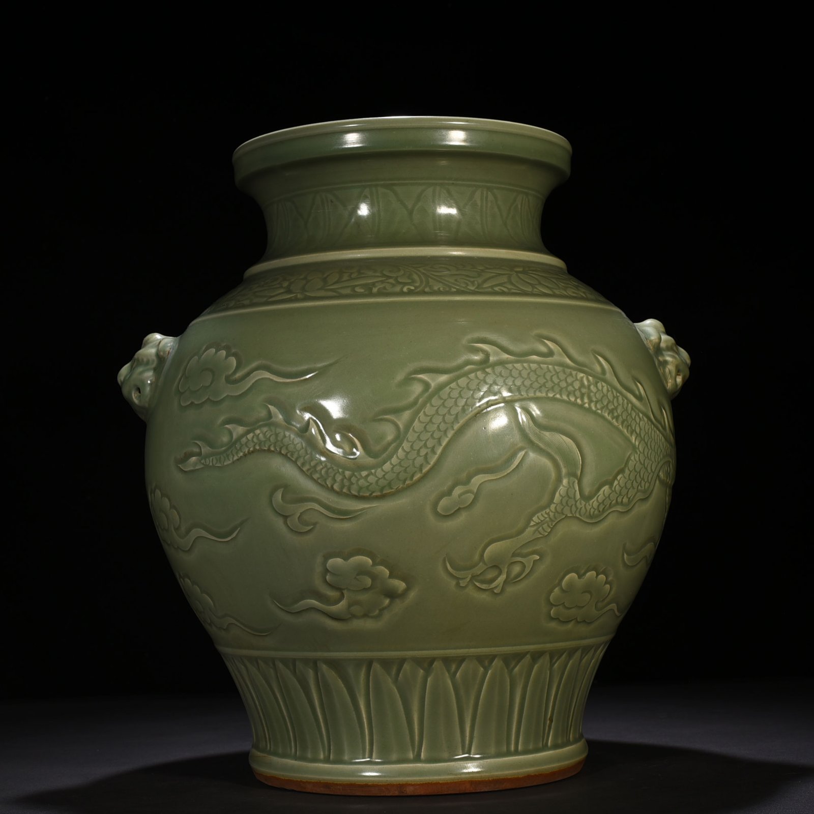 Yuan Dynasty large jar with carved dragon and animal ears