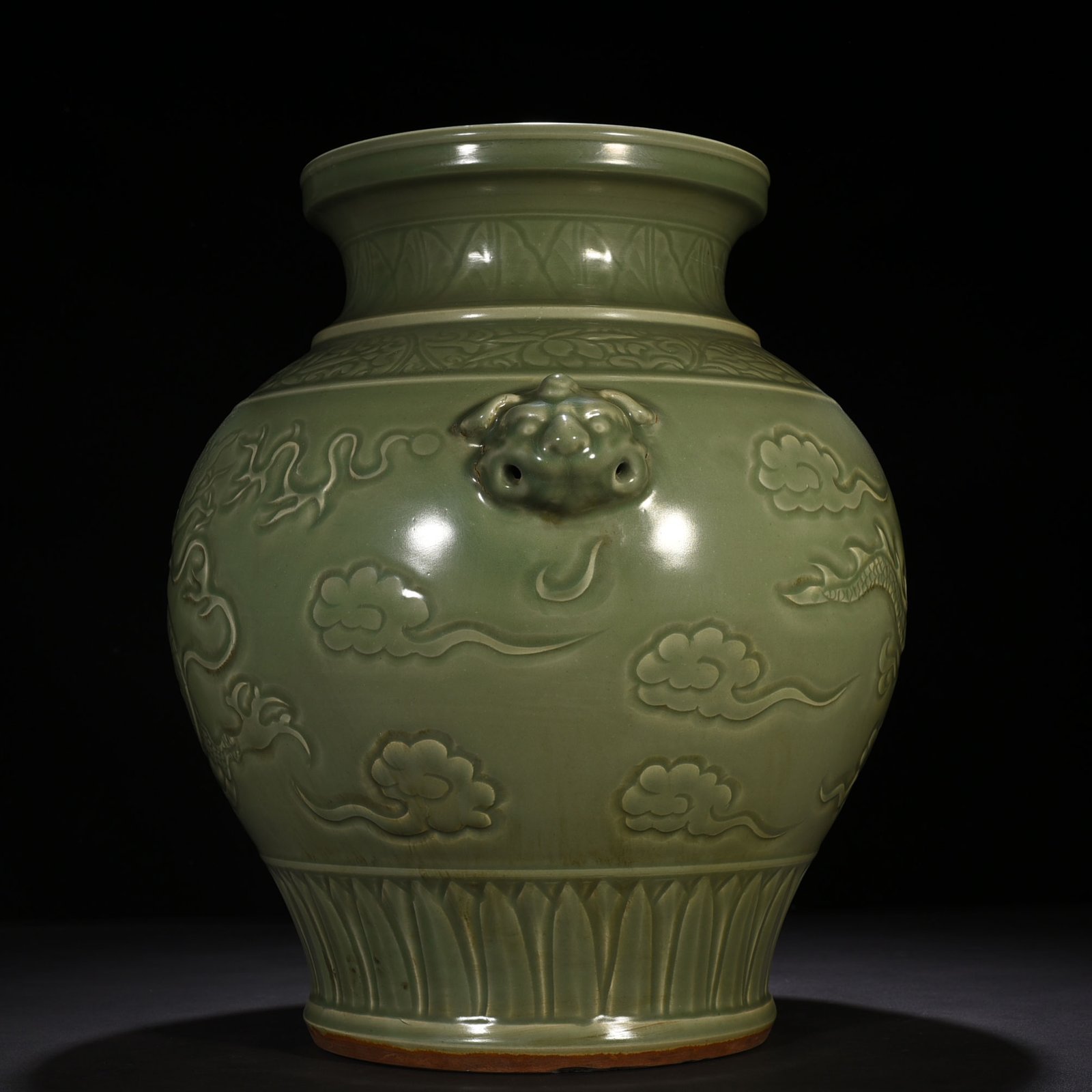 Yuan Dynasty large jar with carved dragon and animal ears