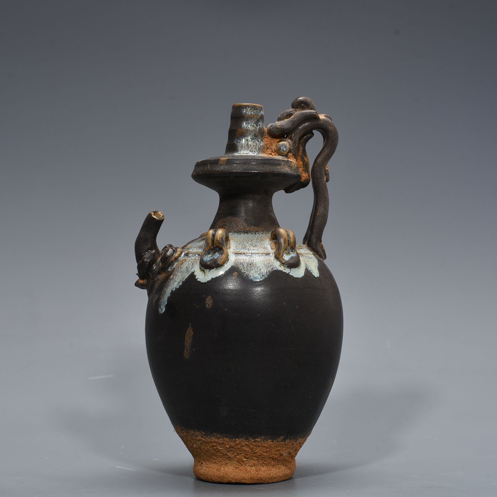 Tang Dynasty Jun kiln variable glaze elephant trunk military holding