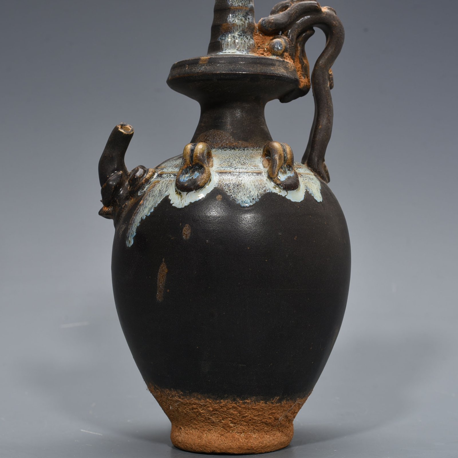 Tang Dynasty Jun kiln variable glaze elephant trunk military holding