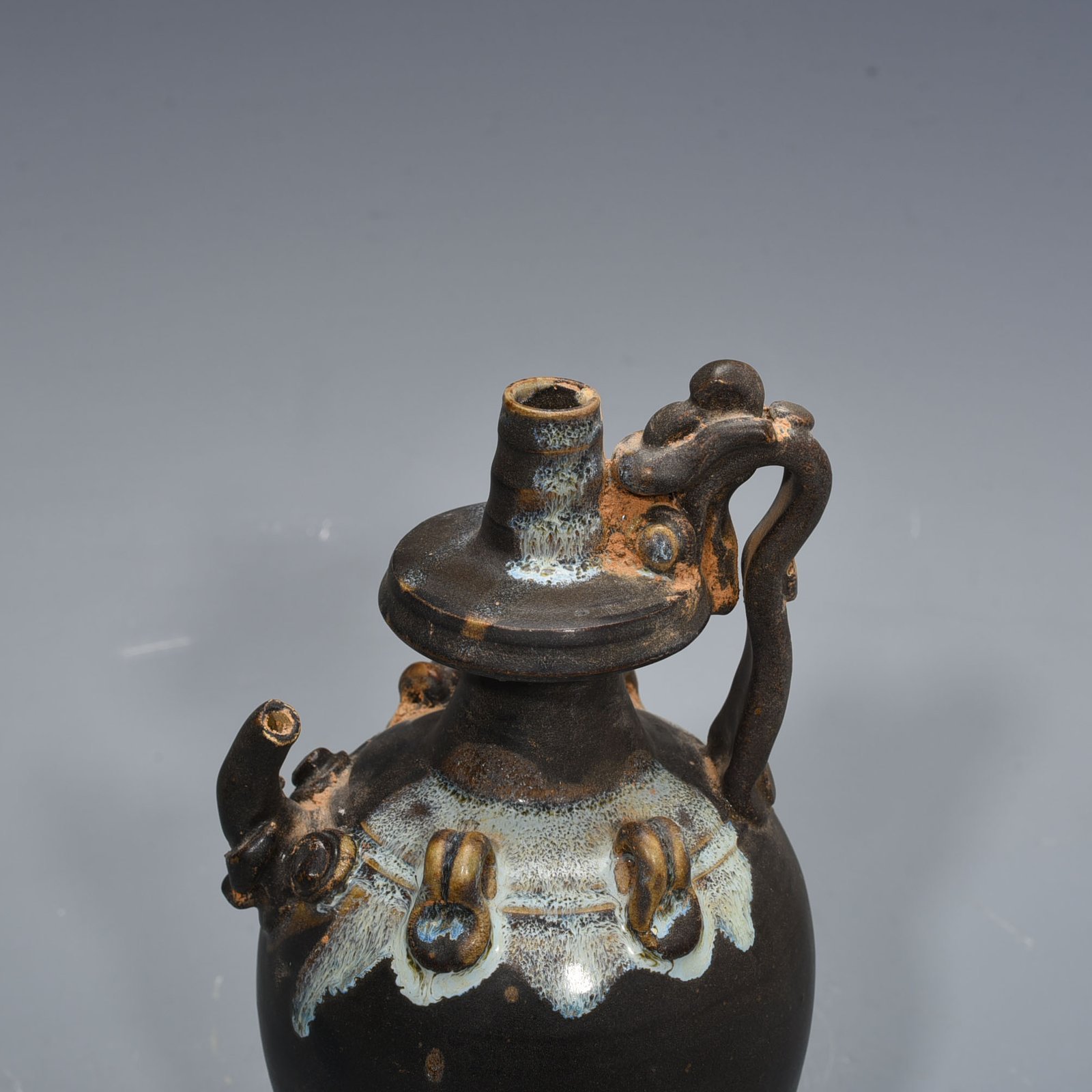 Tang Dynasty Jun kiln variable glaze elephant trunk military holding