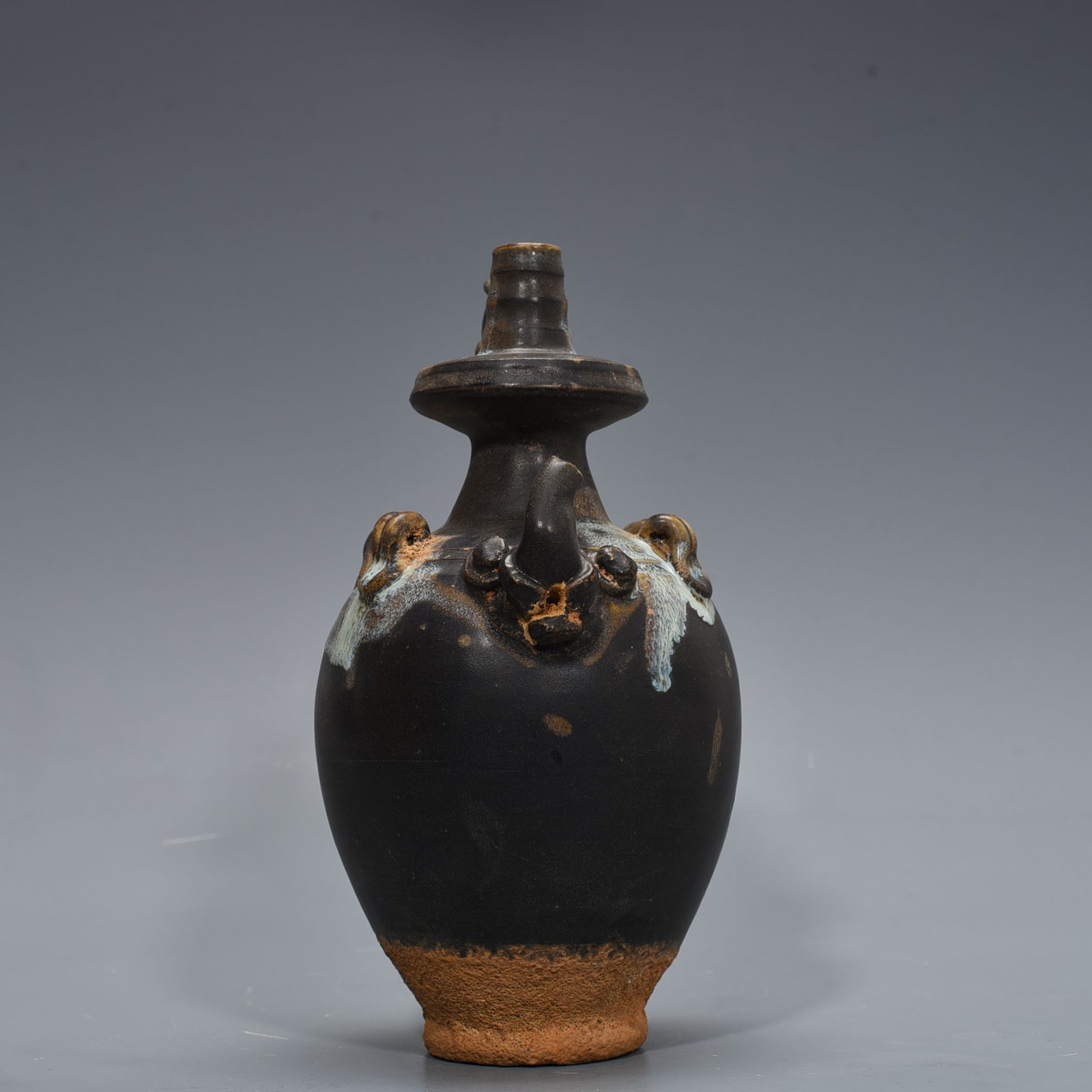 Tang Dynasty Jun kiln variable glaze elephant trunk military holding