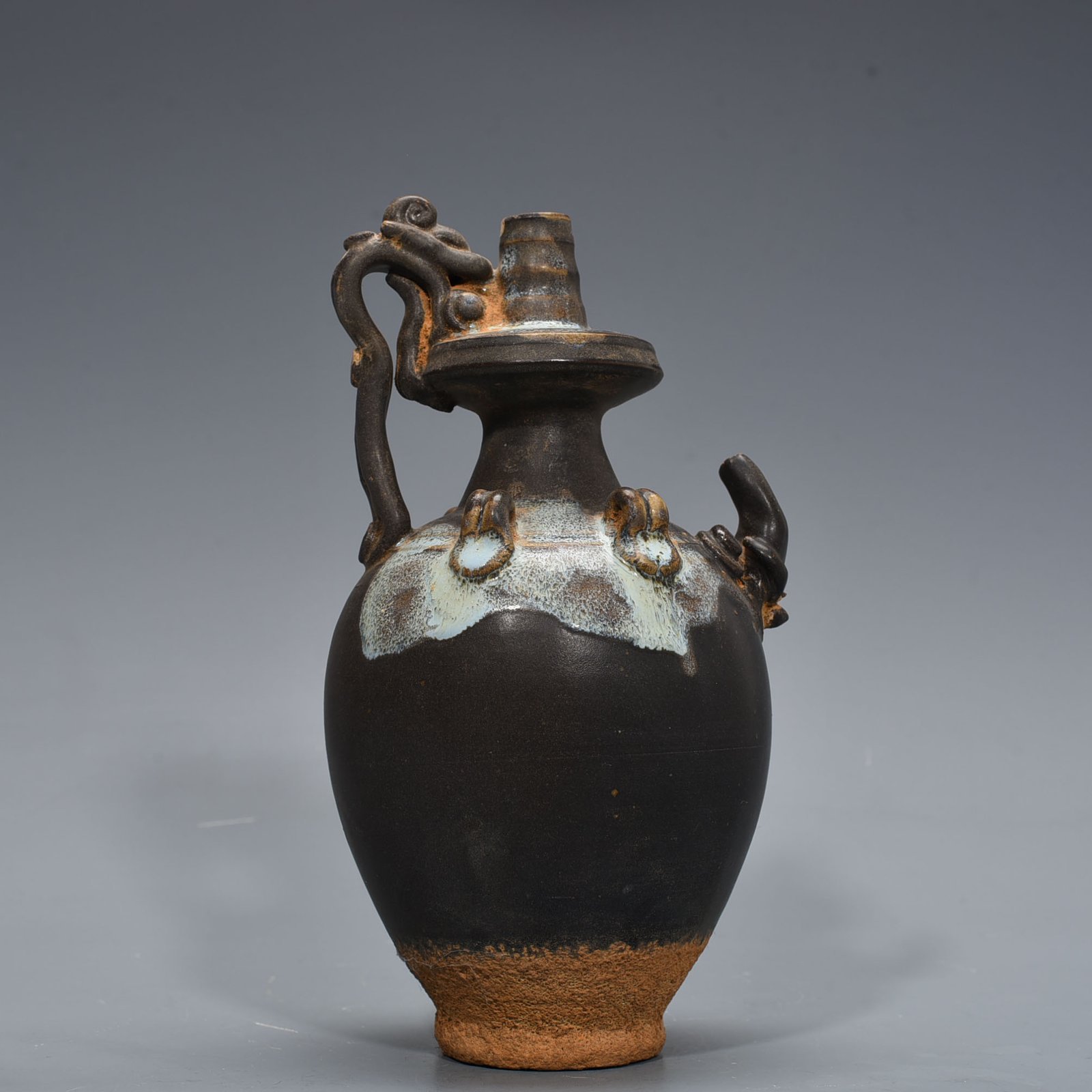 Tang Dynasty Jun kiln variable glaze elephant trunk military holding