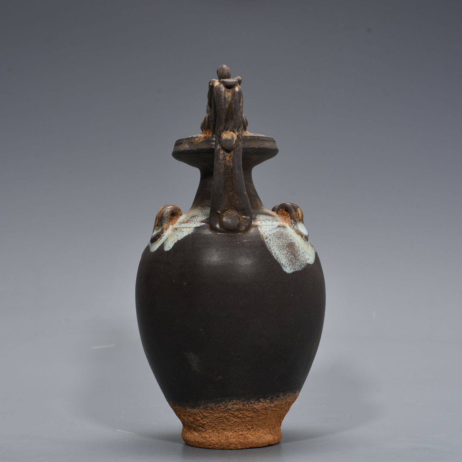 Tang Dynasty Jun kiln variable glaze elephant trunk military holding