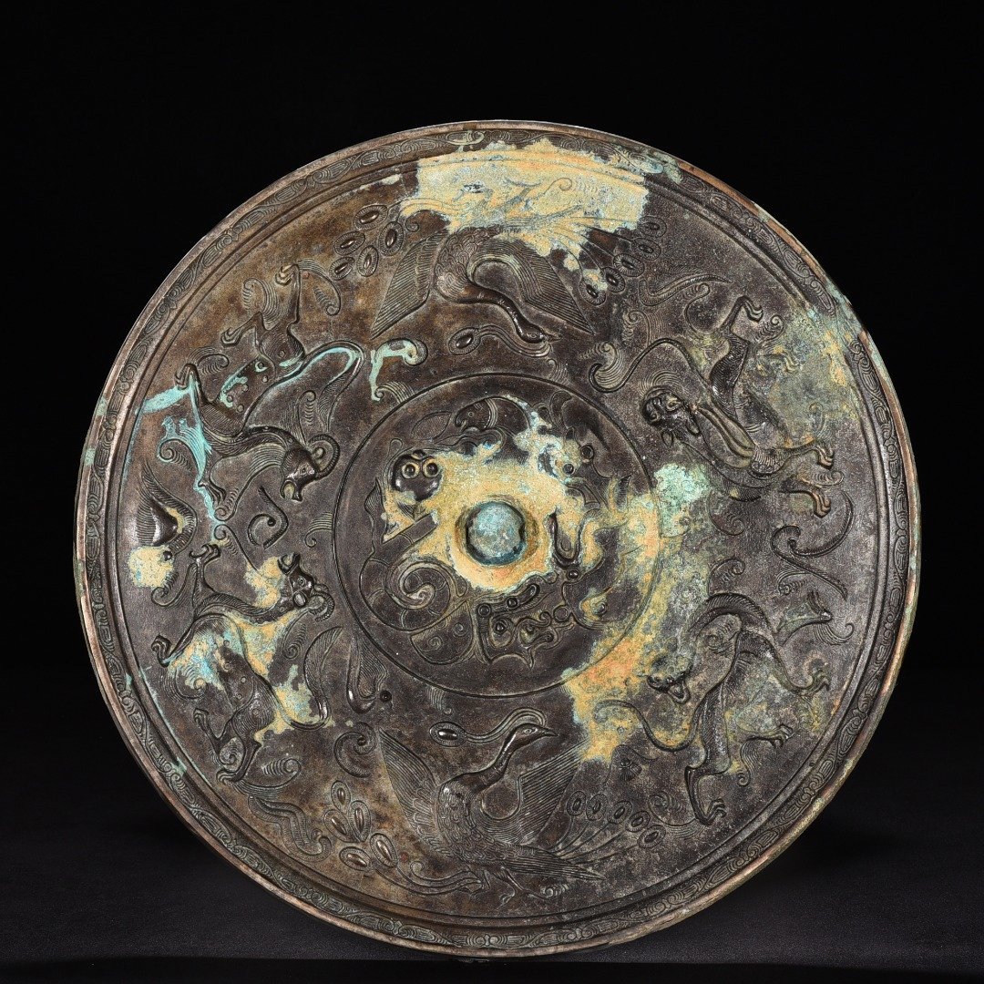 Tang Dynasty Bronze Chilong auspicious animal pattern round mirror
