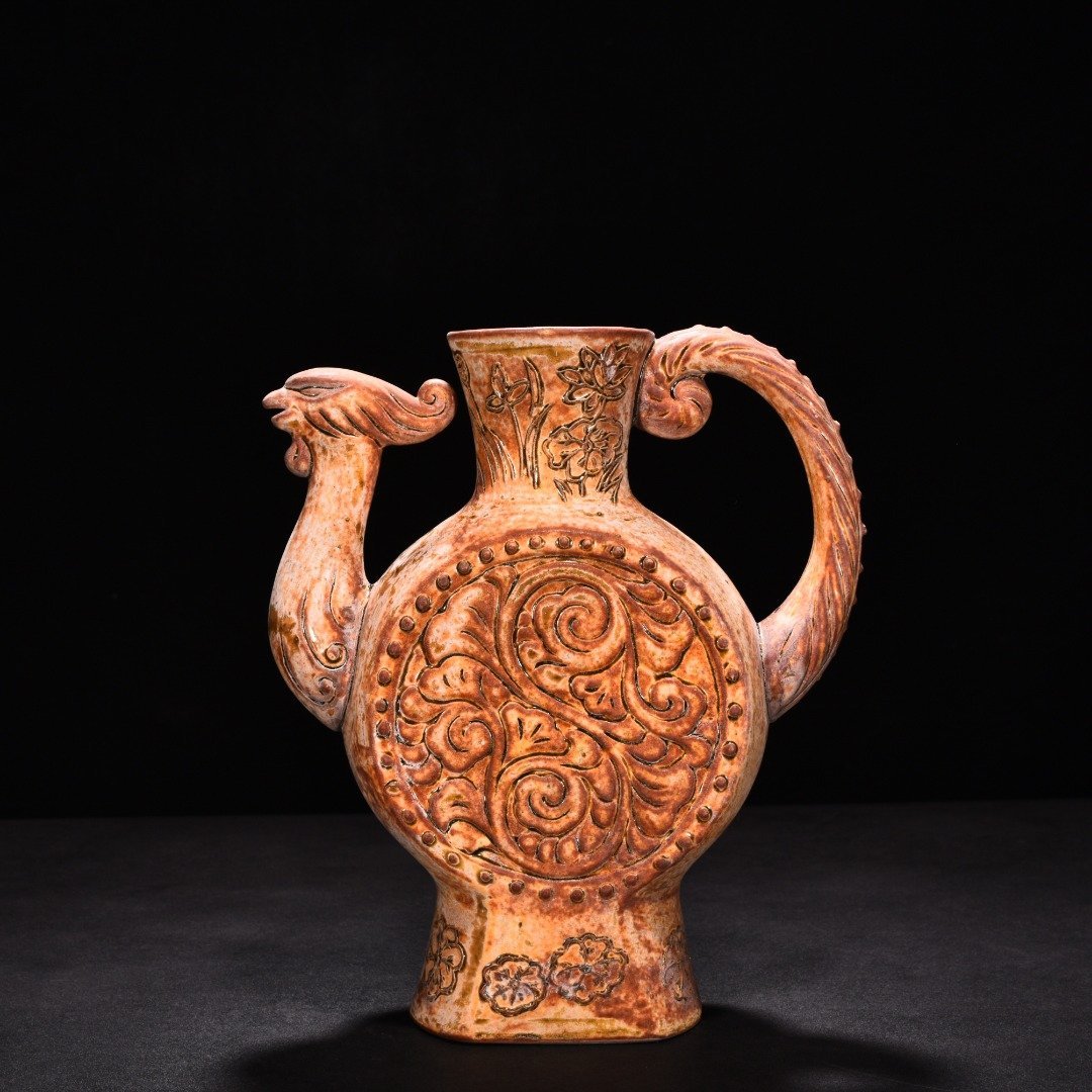 Tang Dynasty yellow glaze phoenix head ewer