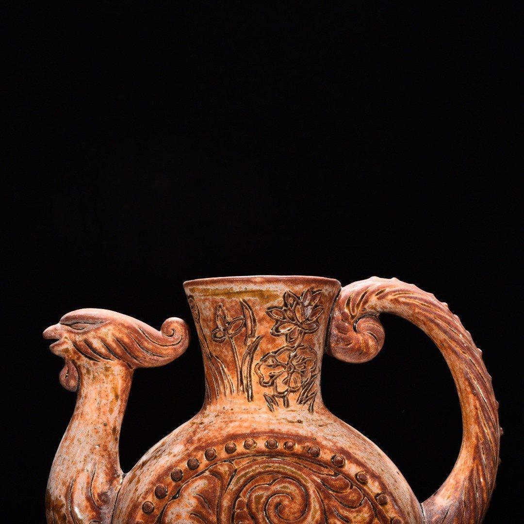 Tang Dynasty yellow glaze phoenix head ewer