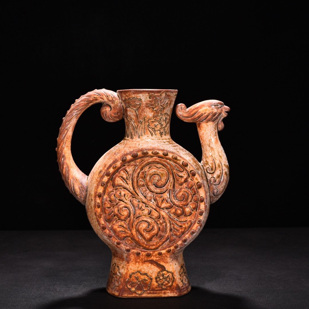 Tang Dynasty yellow glaze phoenix head ewer