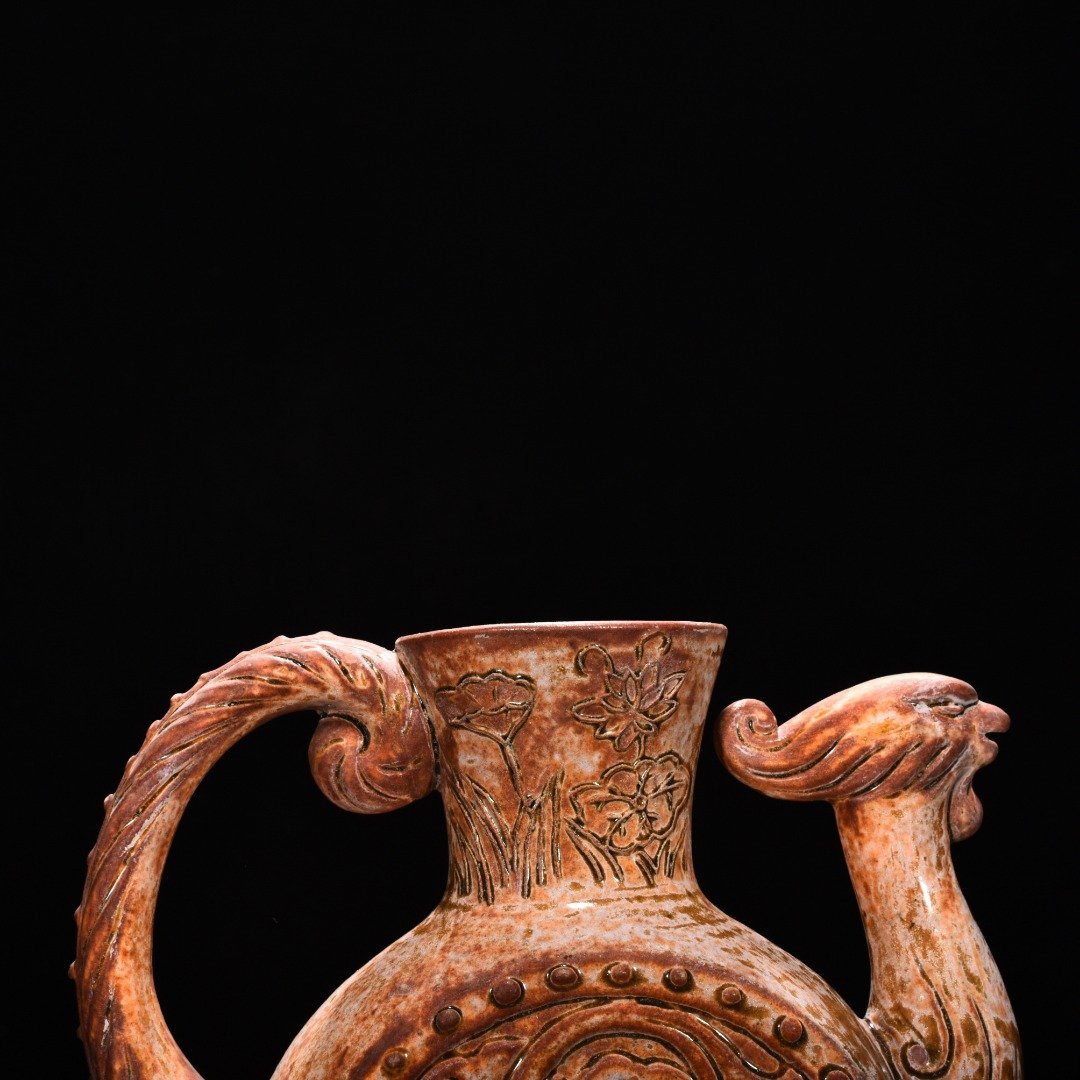 Tang Dynasty yellow glaze phoenix head ewer